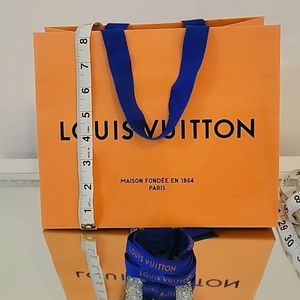 Louis Vuitton paper shopping bag and ribbon. Authentic